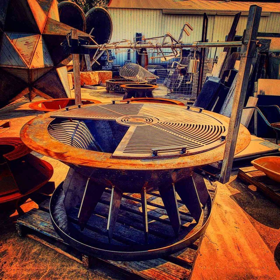 Australian made fire pit Gravitron Series 4 with grill plate, roaster and circular base retainer ring