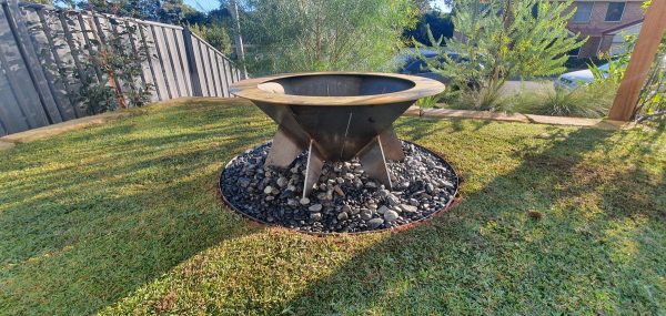 Fire pit Central Coast with retainer base ring filled with pebbles