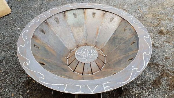 Positive message and design in welded custom wording on Australian made fire pit